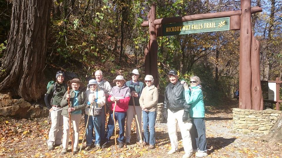 a group of hikers at a trailhead